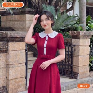 Thiết kế cổ sen phối đính cúc tinh tế trên mẫu đầm B609.