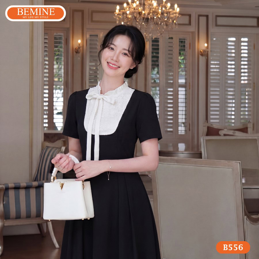 Đầm thiết kế BEMINE cổ tròn phối ren dáng chữ A B556 2 Người mẫu diện đầm chữ a cổ tròn phối ren BEMINE mã B556.