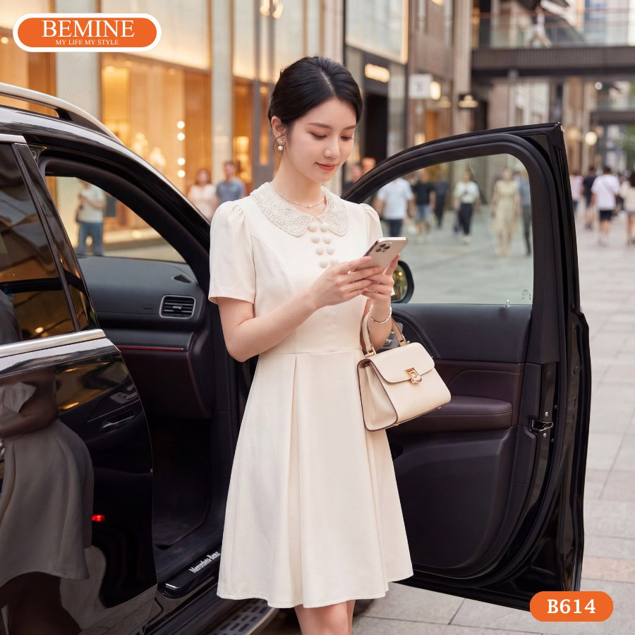 Đầm thiết kế BEMINE cổ sen đính cườm dáng ngắn B614 3 Chi tiết đính cườm tinh tế tạo điểm nhấn nổi bật trên đầm B614.