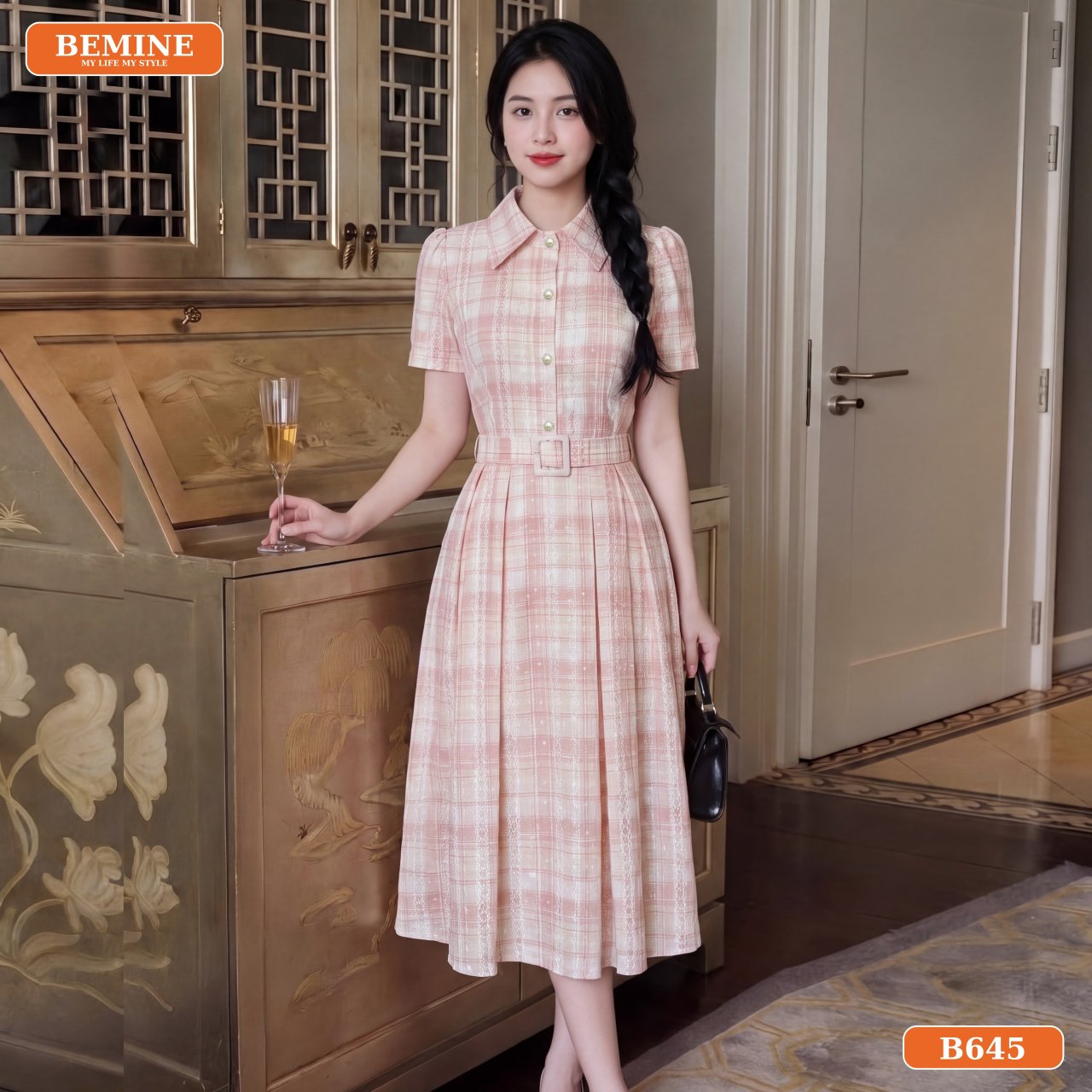 Cận cảnh đường may sắc sảo của mẫu đầm phối đai eo BEMINE B645.