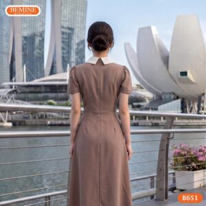 Cận cảnh đường may sắc sảo của mẫu đầm phối cúc BEMINE B651.