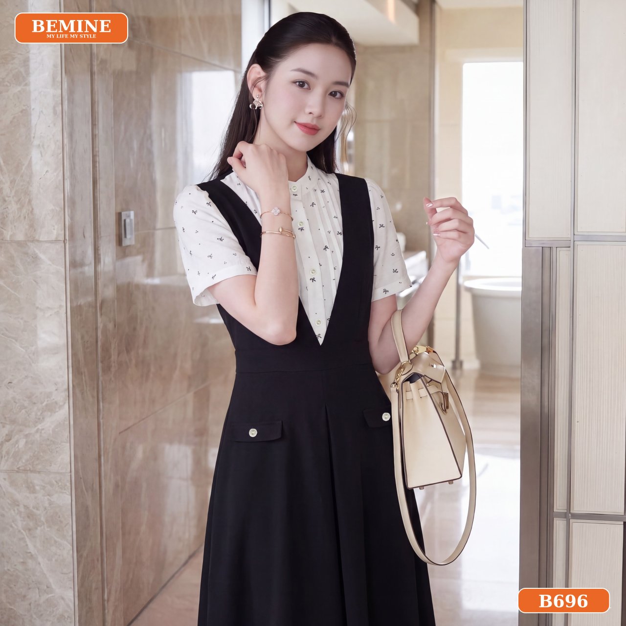 Lợi ích và điểm nổi bật của Đầm công sở BEMINE cổ tròn giả yếm B696