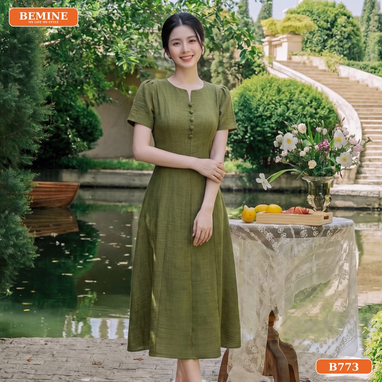 Bề mặt chất liệu đũi vân mây của đầm công sở B773 BEMINE