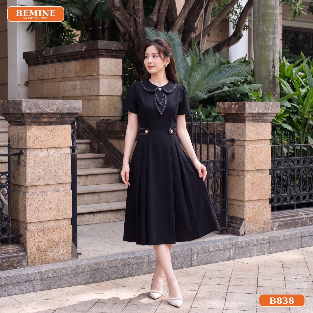 Chi tiết cổ sen viền chỉ nổi và hàng nút giả trên đầm B838