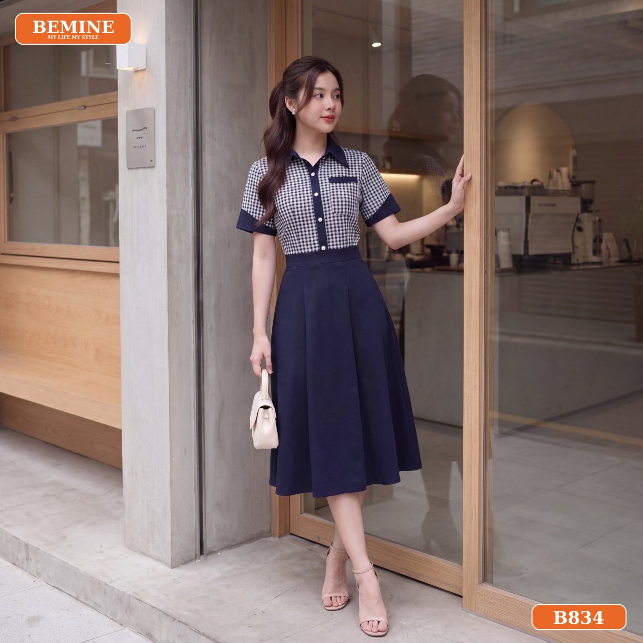 Chi tiết phom dáng xòe nhẹ của đầm chữ A cổ sơ mi B834
