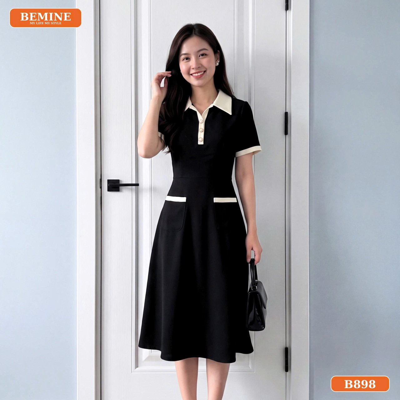 Chi tiết cổ xẻ V phối viền trên đầm công sở B898
