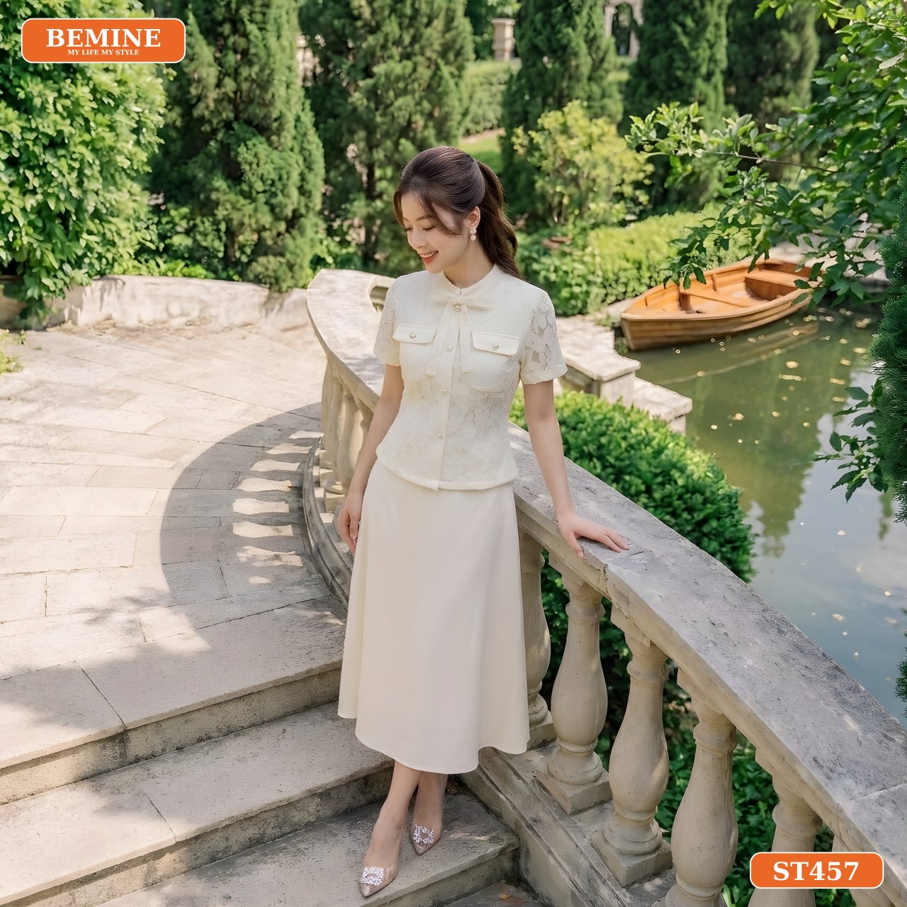 Phom dáng cân đối của set áo cổ trụ ren hoa chân váy dài ST457 BEMINE