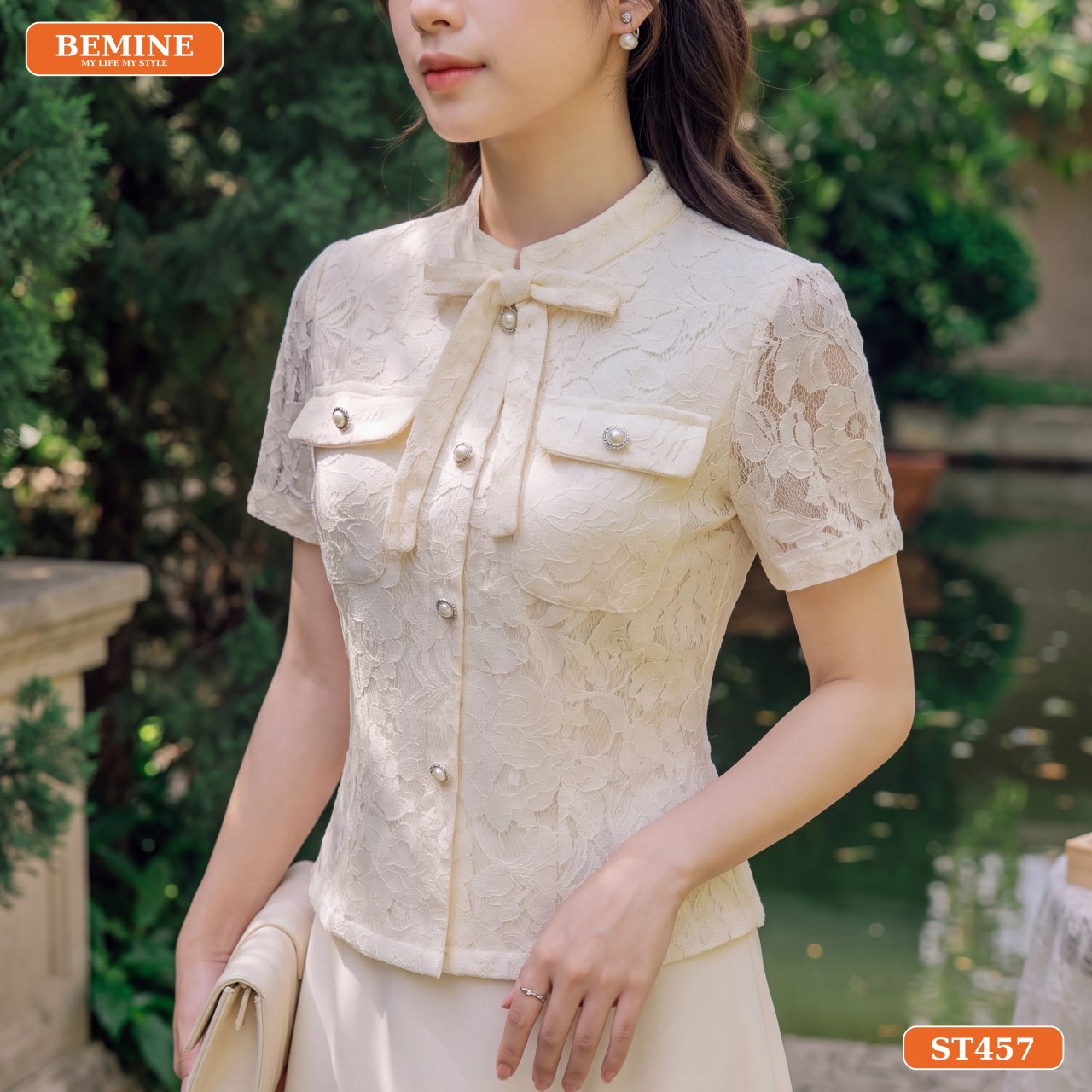 Tổng thể thanh lịch của set áo cổ trụ ren hoa chân váy dài ST457